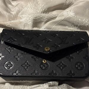 Black Louis Vuitton crossbody